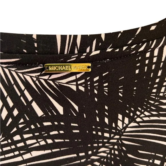 Micheal Kors form fitting, palm tree print. Stretchy material. Lightly worn - Picture 6 of 6